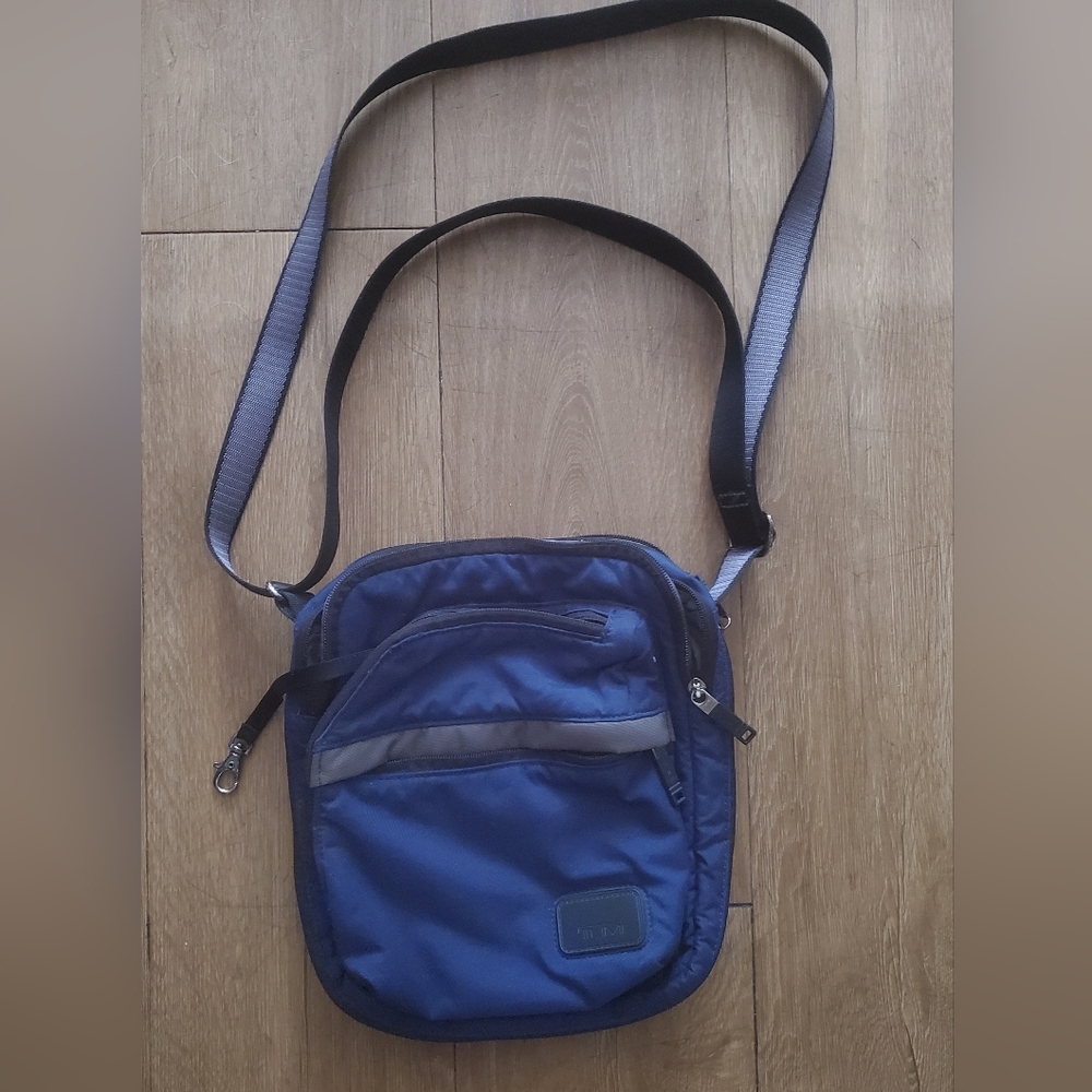 TUMI Navy Blue Organizer Travel Crossbody Bag.